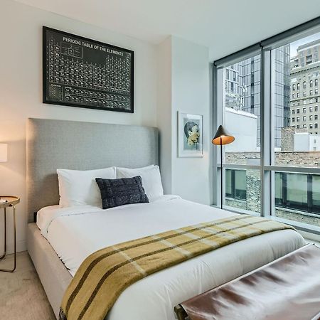 Sentral Michigan Avenue Aparthotel Chicago Cameră foto A bedroom